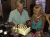 Tommy presents wife Joyce with this yummy whipped cream & fruit for her birthday at Bourbon St. on the Beach.